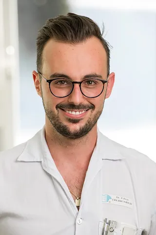 Dr. T. Treibenreif